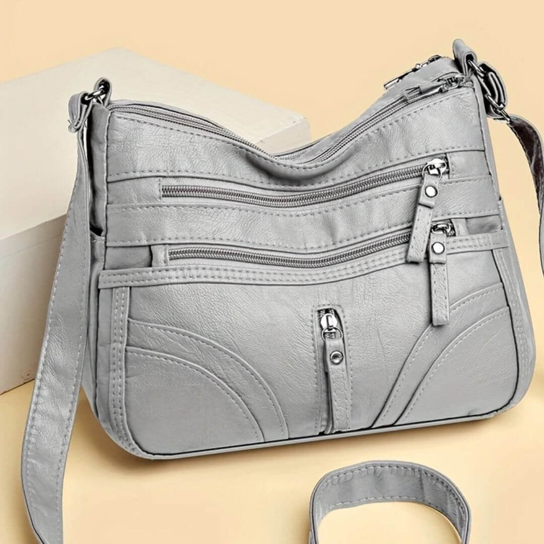 Cheryl’s Sleek Zip Companion | Crossbody Bag - Joan's Bags
